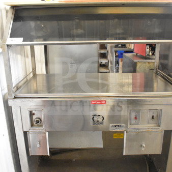 HCH Commercial Heated Buffet, stainless steel, on casters, with control panel and "Caution - Hot" label, used condition.