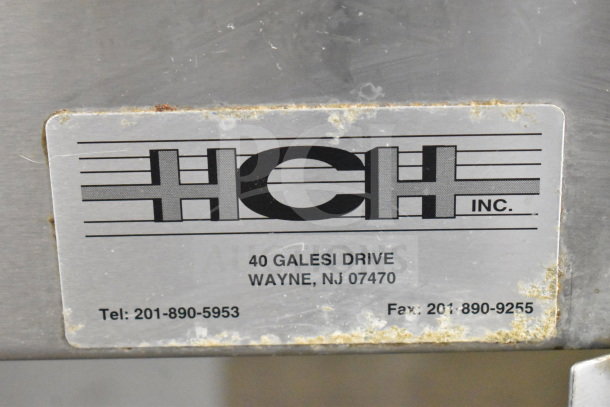 HCH Commercial Heated Buffet with branded label, on casters; address and contact details on tag.