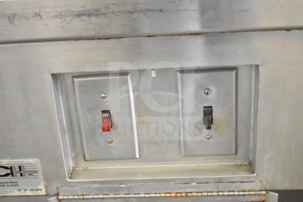 HCH Commercial Heated Buffet with visible power switches, on/off labels, stainless steel surface, minor wear.