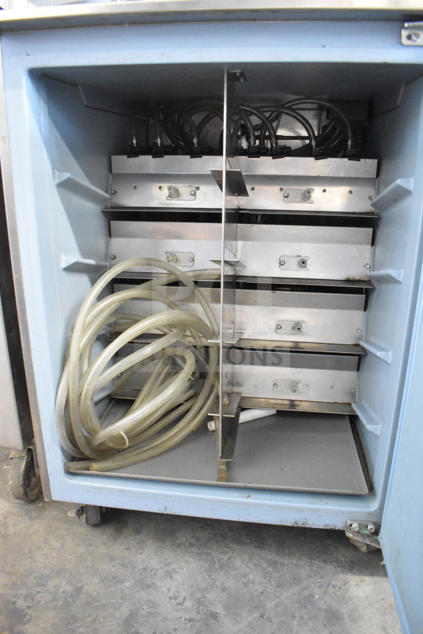 Multiplex MA-8-1US Commercial Blend In Cup Workstation with Single Door Undercounter Cooler, 115V. Interior view, hoses visible.