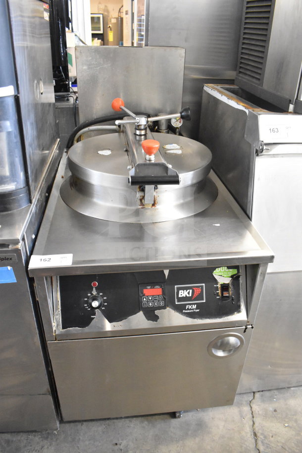 BKI FKM-F commercial floor style electric pressure fryer, 208 volts, 3 phase, used condition, visible control panel with brand label.