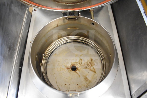 BKI FKM-F pressure fryer, electric powered, 208 volts, 3 phase. Stainless interior with heating elements, used condition.