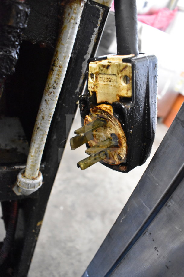 Plug of BKI FKM-F commercial pressure fryer, 208V, 3-phase. Shows signs of use with some rust and wear.
