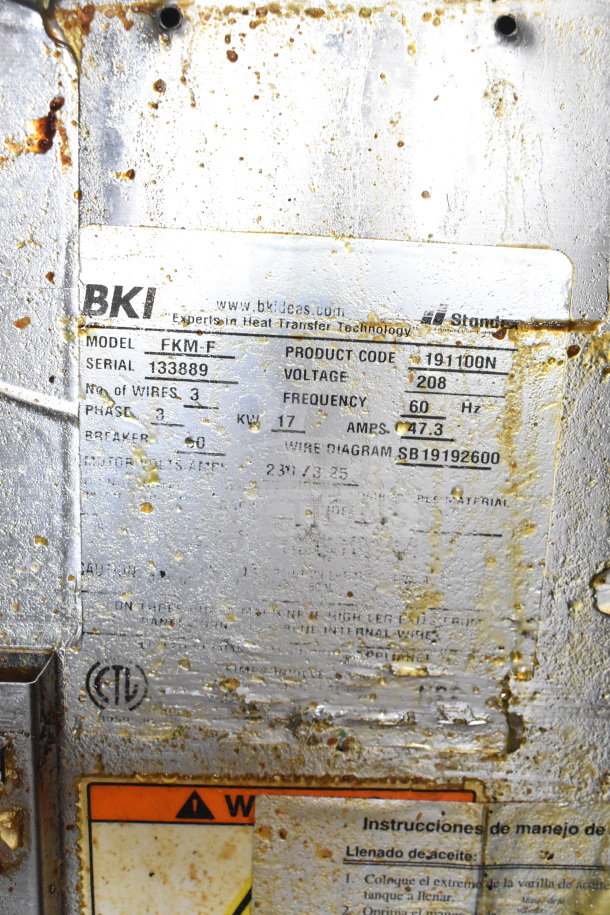 BKI FKM-F electric pressure fryer label showing model, serial number 133889, 208V, 3-phase, 60Hz, 17KW, 47.3A.