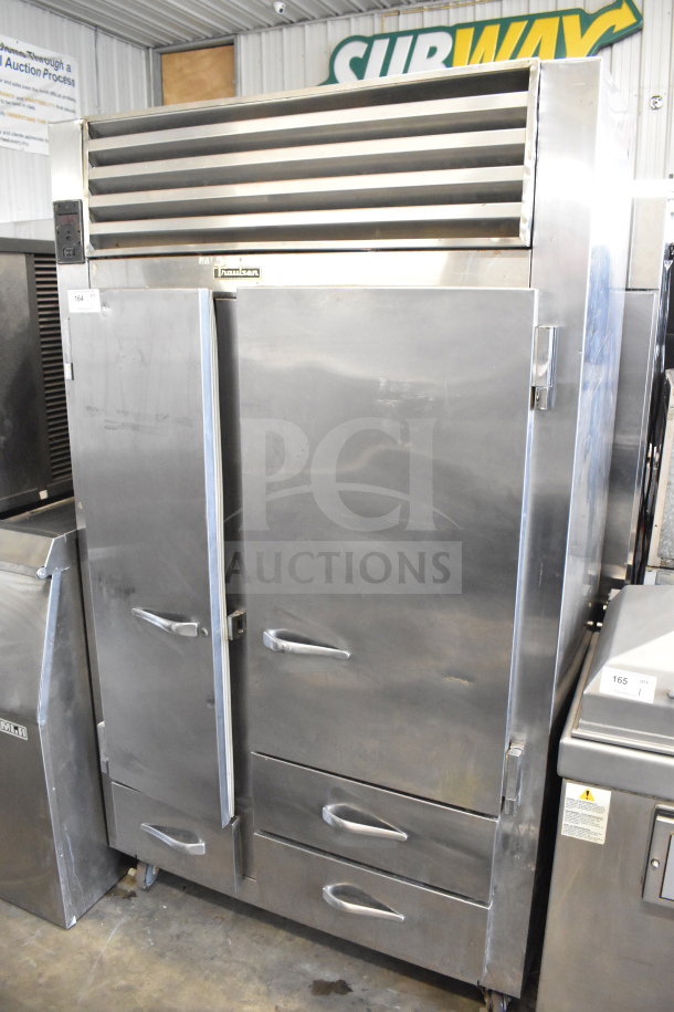 Traulsen RDT 2-24 DUT commercial reach-in fridge with 2 doors, 2 drawers. Stainless steel, 115V, 1 phase, used condition.