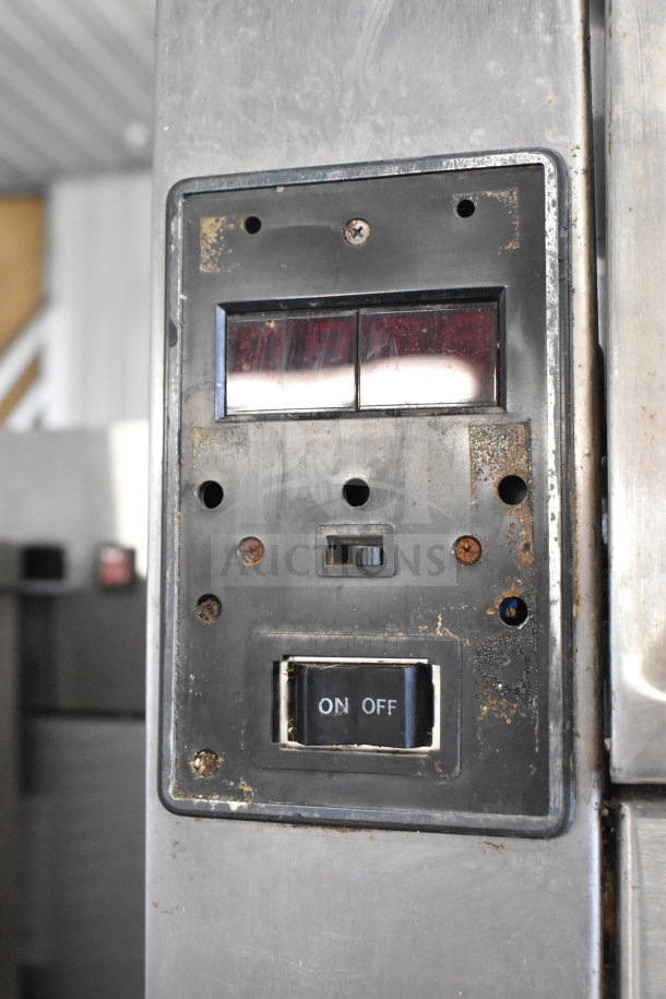 Traulsen RDT 2-24 DUT commercial refrigerator control panel showing wear, with visible "ON/OFF" switch.