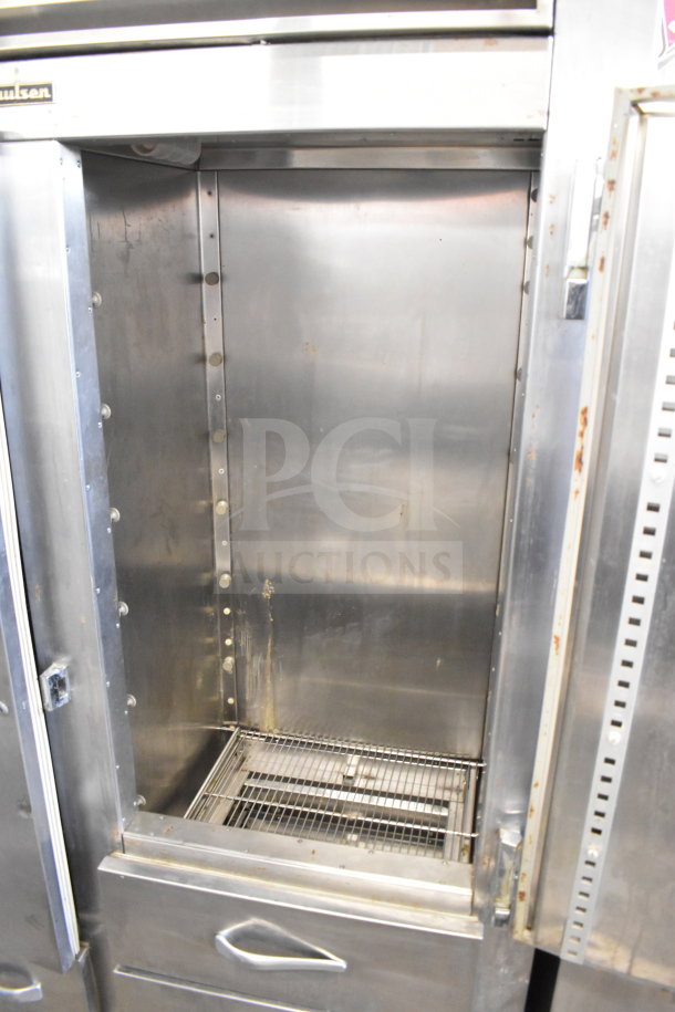 Traulsen RDT 2-24 DUT commercial fridge, two doors, two drawers, stainless steel, 115V, interior view, used condition.