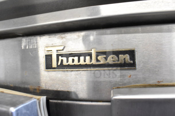 Traulsen RDT 2-24 DUT commercial reach-in refrigerator, 2 doors, 2 drawers, 115V, 1 phase, Traulsen logo visible.