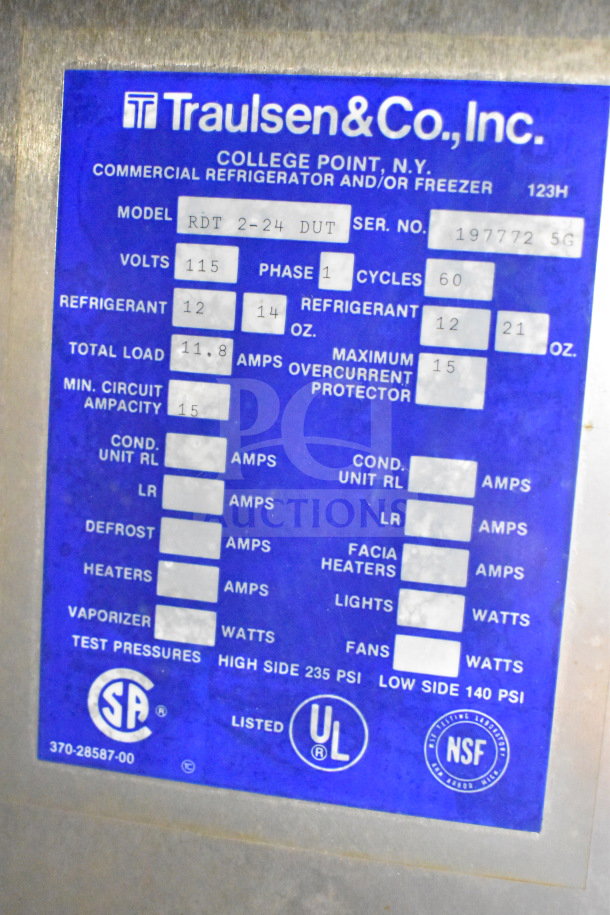 Traulsen RDT 2-24 DUT commercial reach-in refrigerator label, showing model, voltage, and refrigerant details.