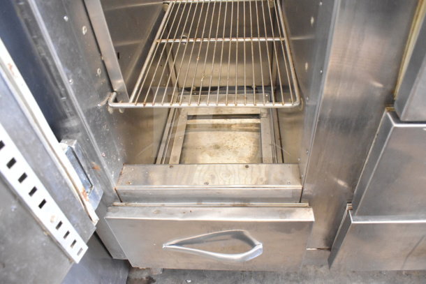 Traulsen RDT 2-24 DUT commercial reach-in fridge with two doors and two drawers, stainless steel, 115 Volts, 1 Phase.