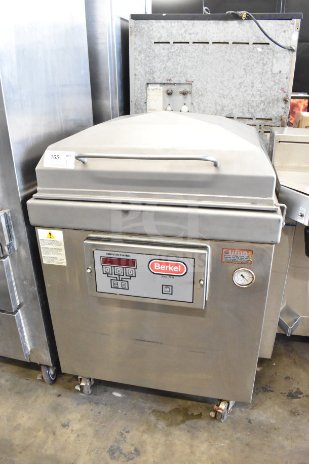 Berkel 400-A commercial vacuum sealer, stainless steel, on casters. Features include digital controls and a pressure gauge. 208V, 3 phase.