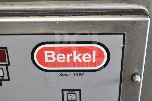 Berkel 400-A commercial floor vacuum sealer, stainless steel, on casters. Visible logo "Berkel Since 1898". 208V, 3 Phase.