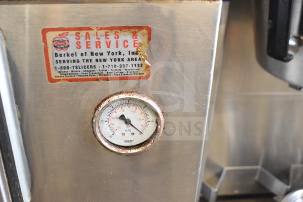 Berkel 400-A Commercial Vacuum Sealer, stainless steel, on casters. Features a pressure gauge. Visible wear and Berkel service label.