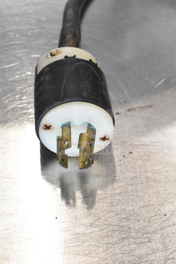 Berkel 400-A commercial vacuum sealer power plug on metal surface, showing wear and 208V, 3-phase connector.