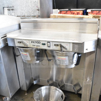 Fetco CBS-62HSt double coffee machine, includes 3 brew baskets, countertop design, 120V, excellent condition.