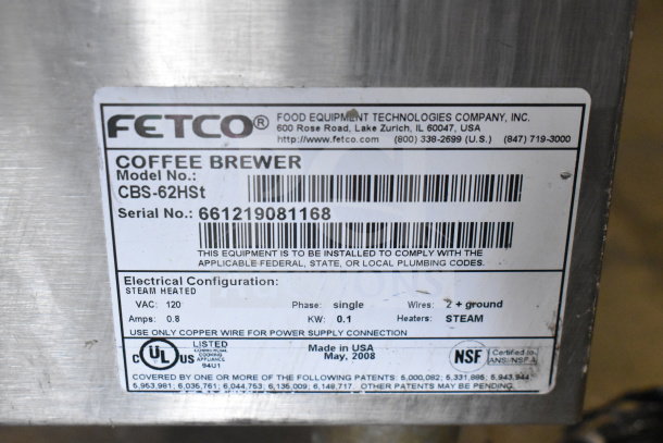 Fetco CBS-62HSt coffee machine label, model and serial number visible, 120 volts, steam heated, NSF certified.