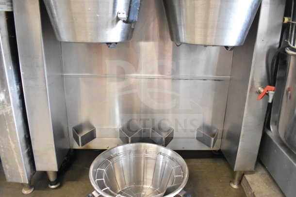 Fetco CBS-62H commercial countertop double coffee machine with three brew baskets, stainless steel, 120V, 1 Phase.
