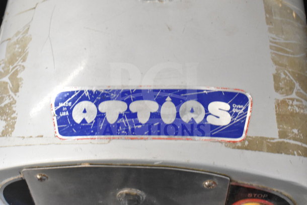 Attias HS40DA 40L spiral mixer, visible brand label. Features mixing bowl, bowl guard, dough hook. Used condition.