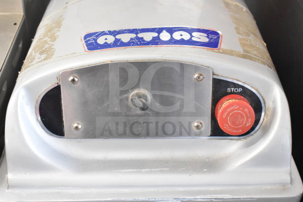 Attias HS40DA spiral mixer with visible Attias logo and red stop button, showing signs of wear.