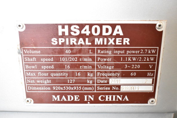 Attias HS40DA commercial spiral mixer label detailing 40L volume, 2.7kW input, 2011 model, made in China.