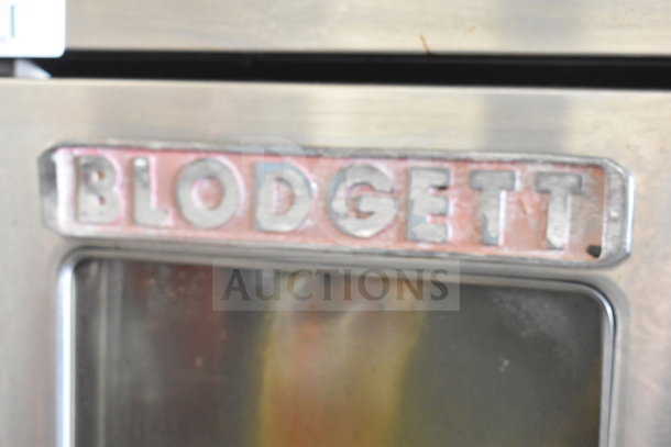 Blodgett commercial convection oven, gas-powered, with view-through doors and thermostatic controls, on commercial casters.