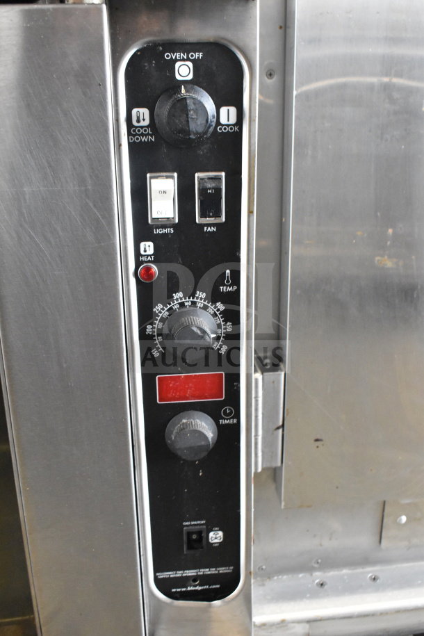 Blodgett commercial gas convection oven control panel, features thermostatic controls, view-through doors, on commercial casters.