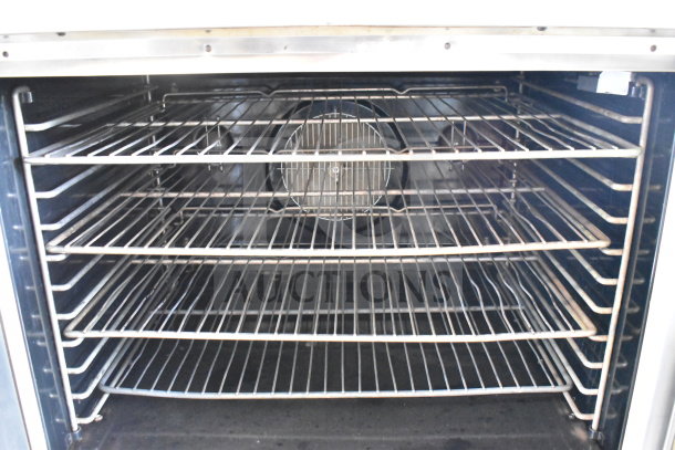 Blodgett commercial gas convection oven with view-through doors, thermostatic controls, and commercial casters.