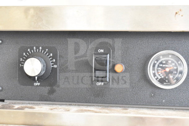 CresCor CCB150 commercial heated holding cabinet control panel showing temperature dial, on/off switch, and thermometer.