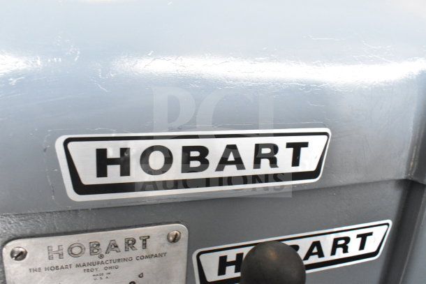 Hobart H-600T Commercial 60 Qt Mixer, includes bowl, dough hook, whisk, 208V, 3 phase, manufacturer plate visible.