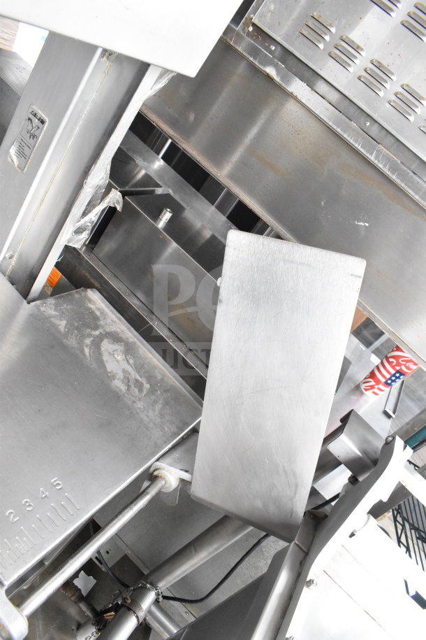 Hobart 6614 Commercial Meat Saw, stainless steel, floor style, 200-230 volts, 3 phase, in used condition.