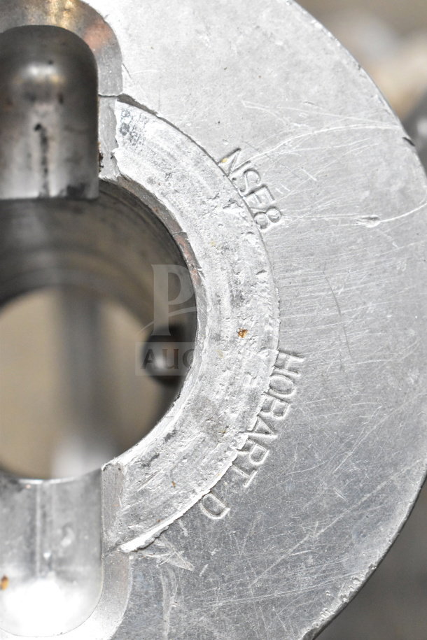 Berkel FMS60 commercial dough mixer attachment. Metal surface with visible markings "NSF8" and "HOBART."
