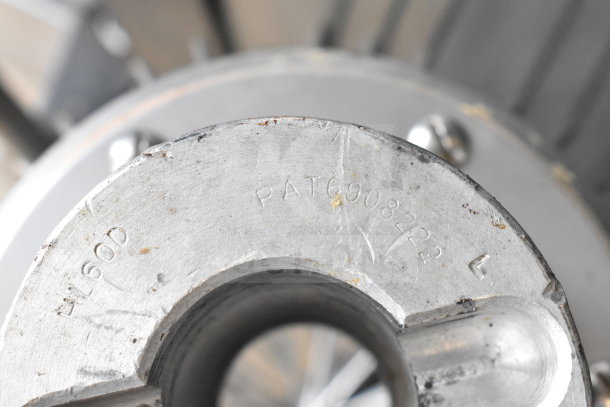 Berkel FMS60 mixer base showing model number and patent markings, highlighting durable metal construction.
