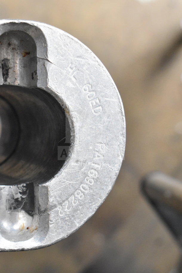 Berkel FMS60 dough mixer component close-up, showing visible markings "HL 60ED" and "PAT 1690917" on a metallic surface.