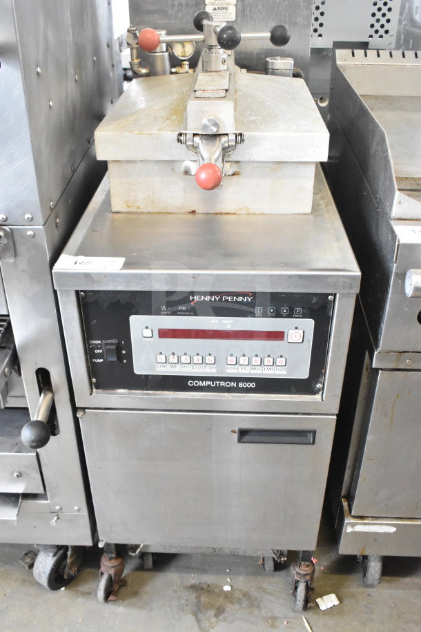 Henny Penny 500C Commercial Electric Pressure Fryer on casters, 208V, 3 Phase, Computron 8000 controls, stainless finish.