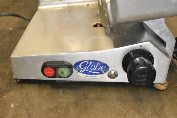 Globe C9 Commercial Countertop Meat Slicer, 115V, used. Features start/stop buttons, dial, and Globe Chefmate label.