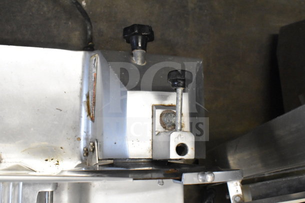Globe C9 Commercial Countertop Meat Slicer, showing top controls, metal construction, and visible wear. 115 volts, 1 phase.