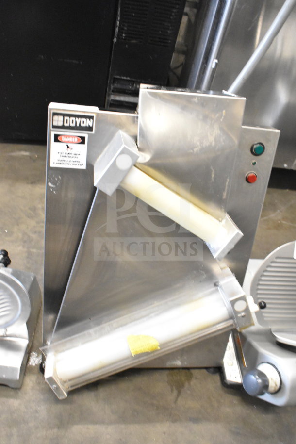 Doyon DL18DP two-stage dough sheeter, 18" countertop model, stainless steel, 120V, labeled with safety and Doyon branding.