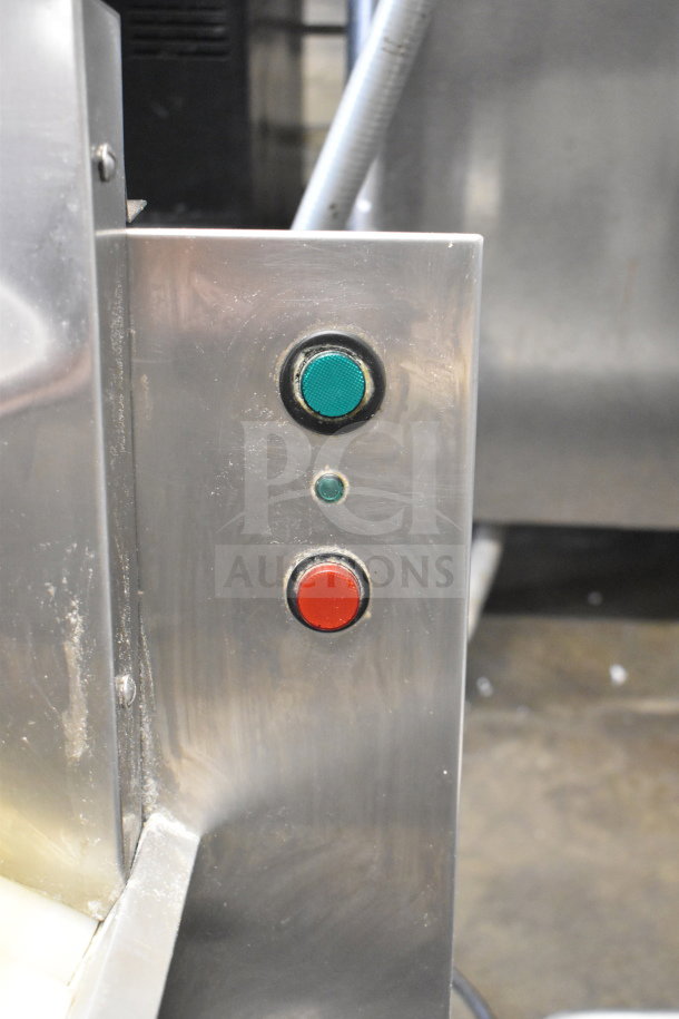 Doyon DL18DP dough sheeter control panel with green and red buttons, showing the stainless steel finish.