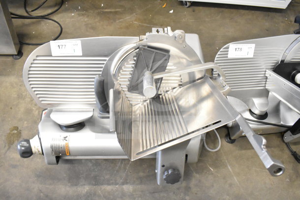 Hobart commercial countertop meat slicer, 120 volts, 1 phase, stainless steel, used condition.