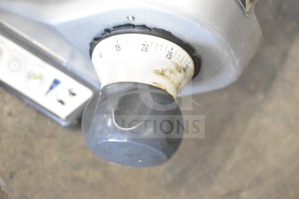 Hobart Commercial Countertop Meat Slicer, control knob detail. Features adjustable thickness dial. 120 Volts, 1 Phase.