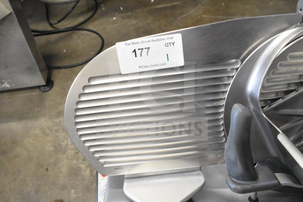 Hobart commercial countertop meat slicer, 120 volts, 1 phase, stainless steel, excellent condition, auction tag visible.