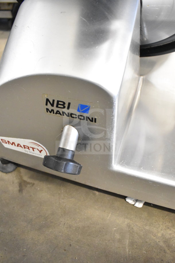 Manconi 300 IX meat slicer with blade sharpener, 120V, 1 Phase. Features NBI Manconi logo and Smarty label.