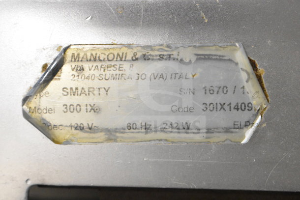 Manconi 300 IX Commercial Meat Slicer label showing model, serial number, and specifications, 120V, 60Hz, 242W.
