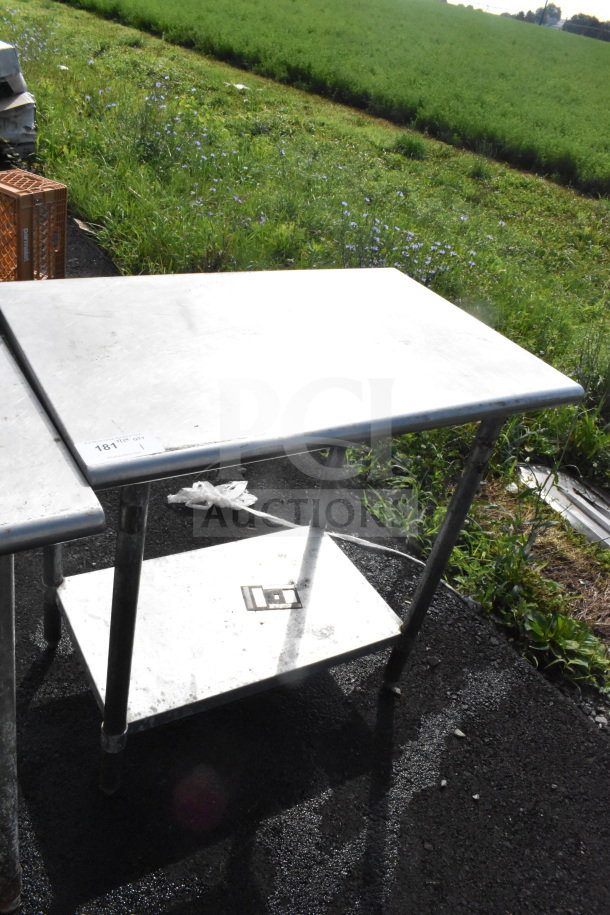 Commercial stainless steel table with sturdy under shelf. Appears in good condition. Visible label: "181" indicates item number.