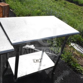 Commercial stainless steel table with sturdy under shelf. Appears in good condition. Visible label: "181" indicates item number.