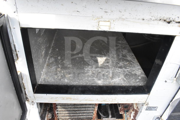 2021 Leader NLB72 commercial 3-door undercounter cooler; visible wear and dirt, 115 volts, single phase, model NLB72.