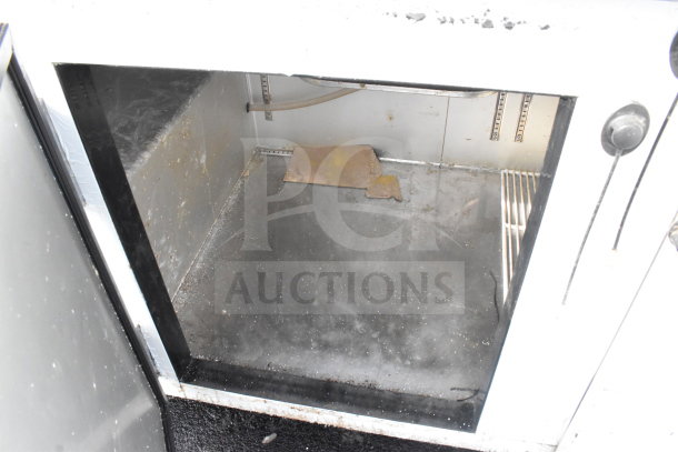 2021 Leader NLB72 commercial 3-door undercounter cooler, shows interior wear, 115 volts, 1 phase, commercial use.