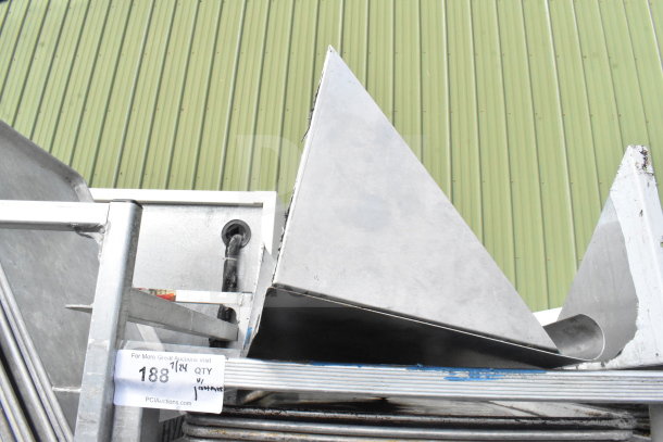 Commercial pan transport rack with 70 baking pans, featuring commercial casters. Item tag visible with auction information.