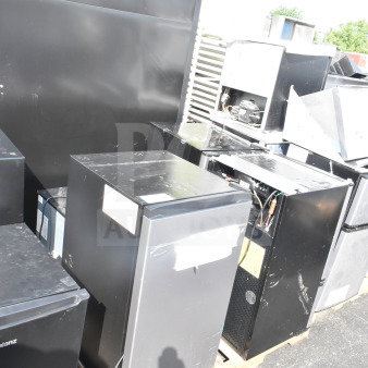 Four mini coolers including Hisense and Arctic King, black finish, 115 volts, 1 phase, on a pallet, used condition.