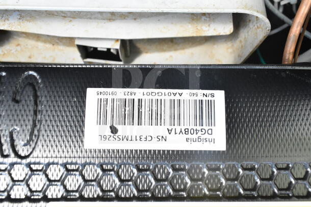 Four mini coolers including Hisense and Arctic King. Features 115 volts, 1 phase. Serial number and barcode visible.